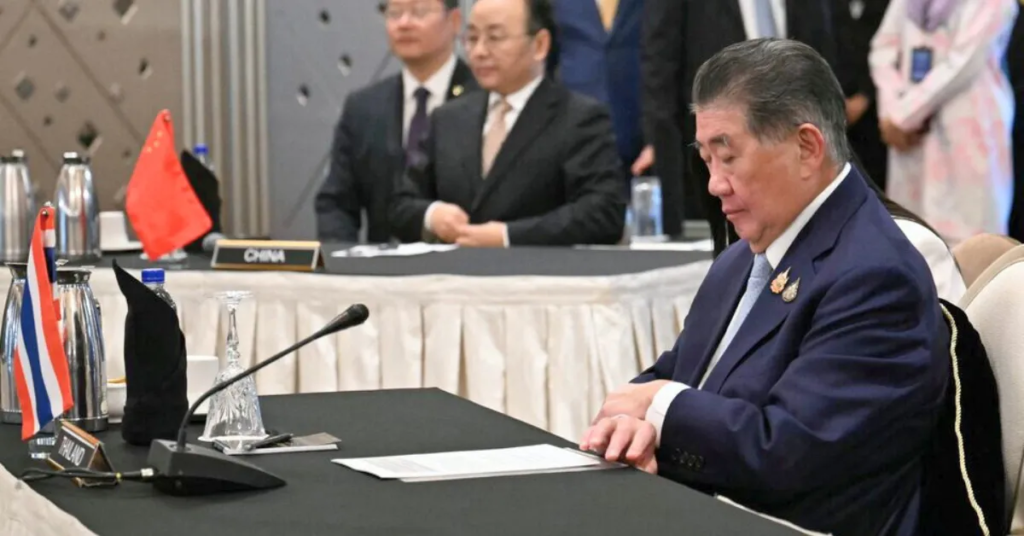 Thailand official reviews documents during ASEAN ceasefire negotiations with combodia in July 2025.